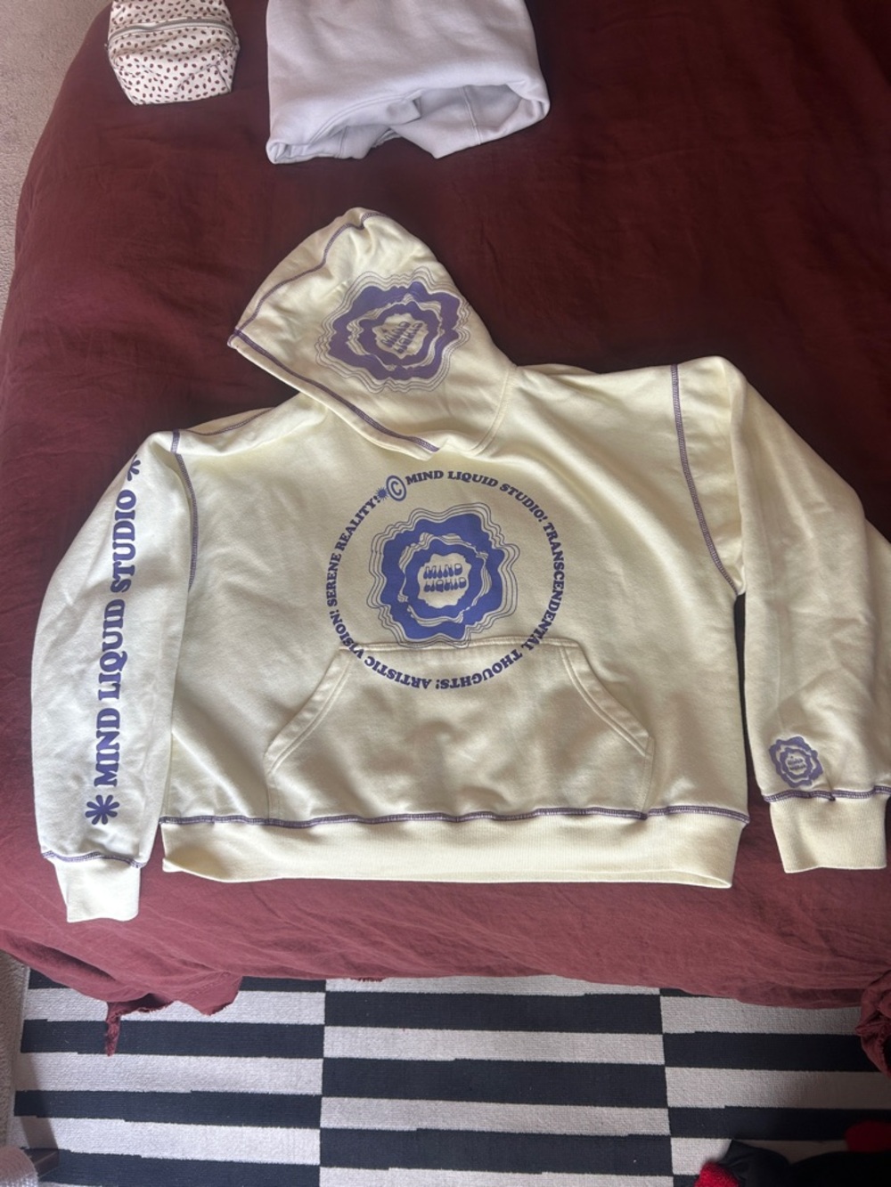 Mind Liquid Studio Cream Hoodie with Purple Stitching
